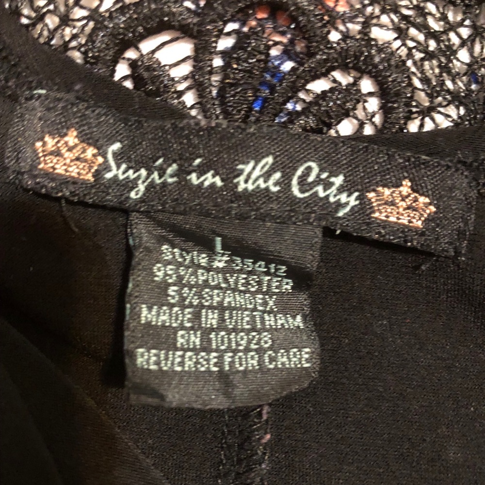 Large polyester/spandex blouse